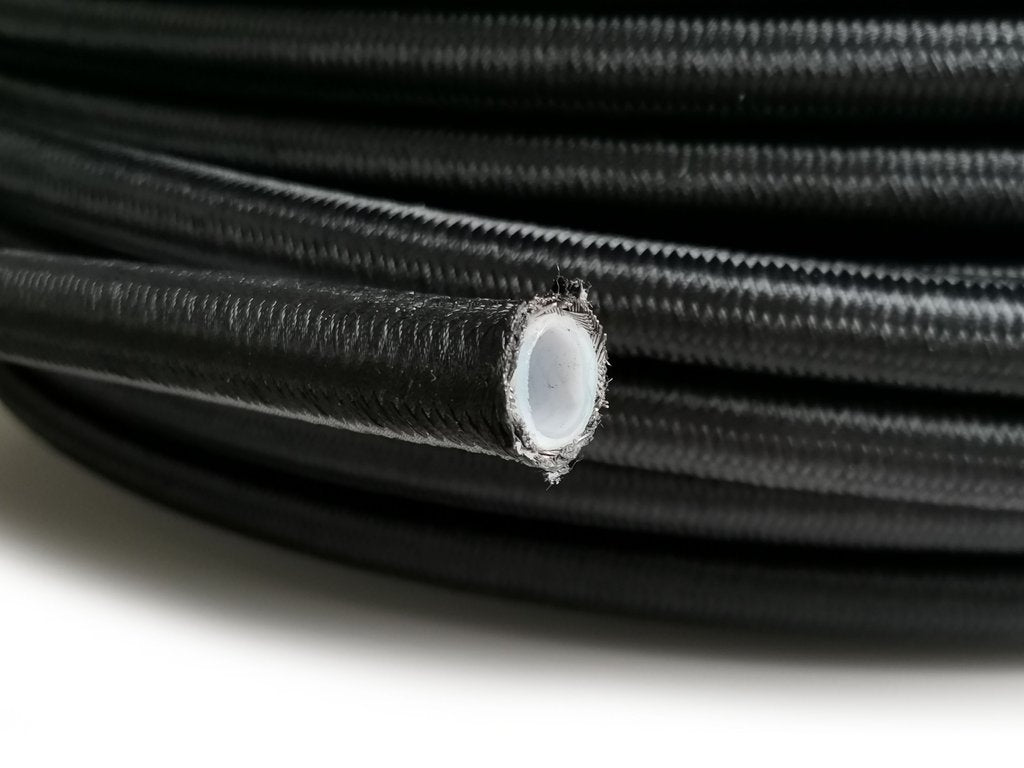 AN6 PTFE Teflon letku Teräspunoksella (musta nylon)